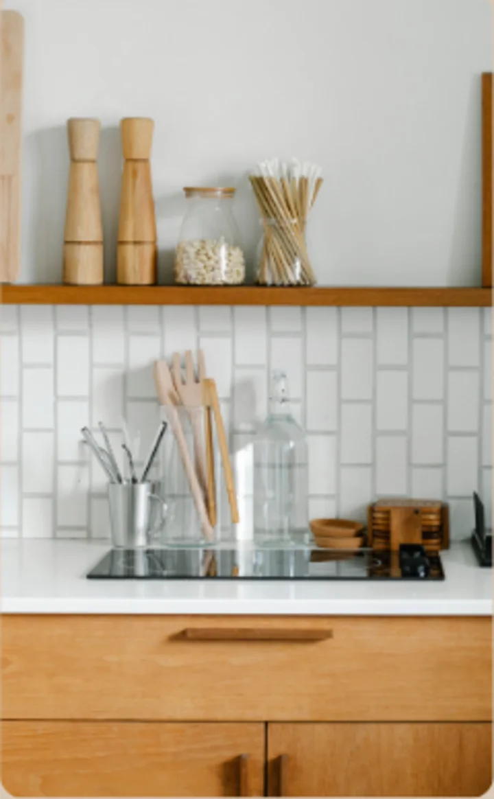An organized kitchen counter with guest essentials